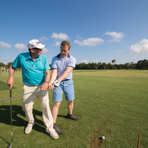 Skip Malek teaching golf