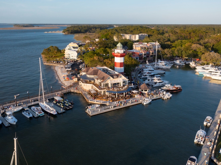 Aerial image of the Harbour Town Lighthouse and Quarterdeck and the Harbour Town Yacht Basin