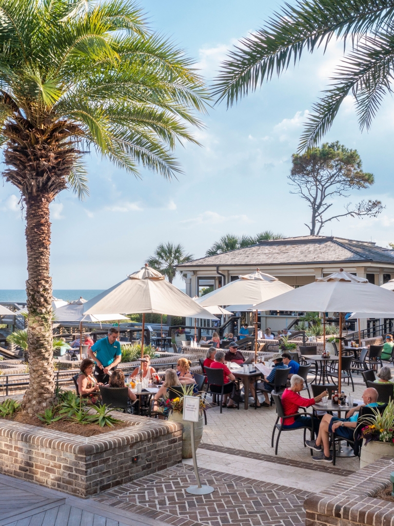 People sitting outside at the Coast Restaurant 