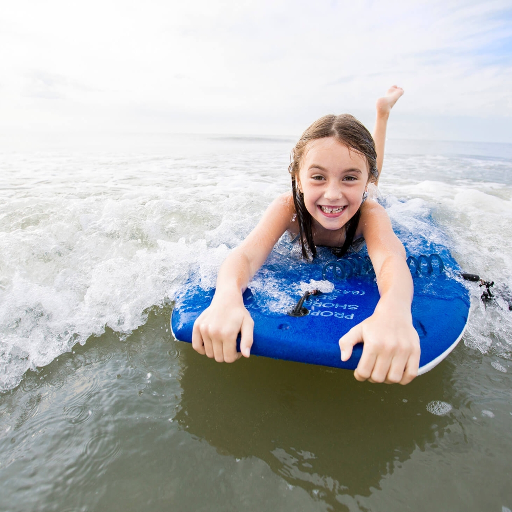 Child on a bogey board 