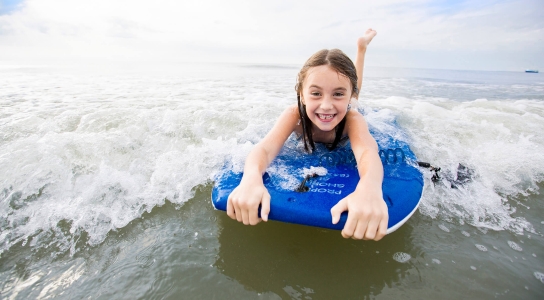 Child on a bogey board 